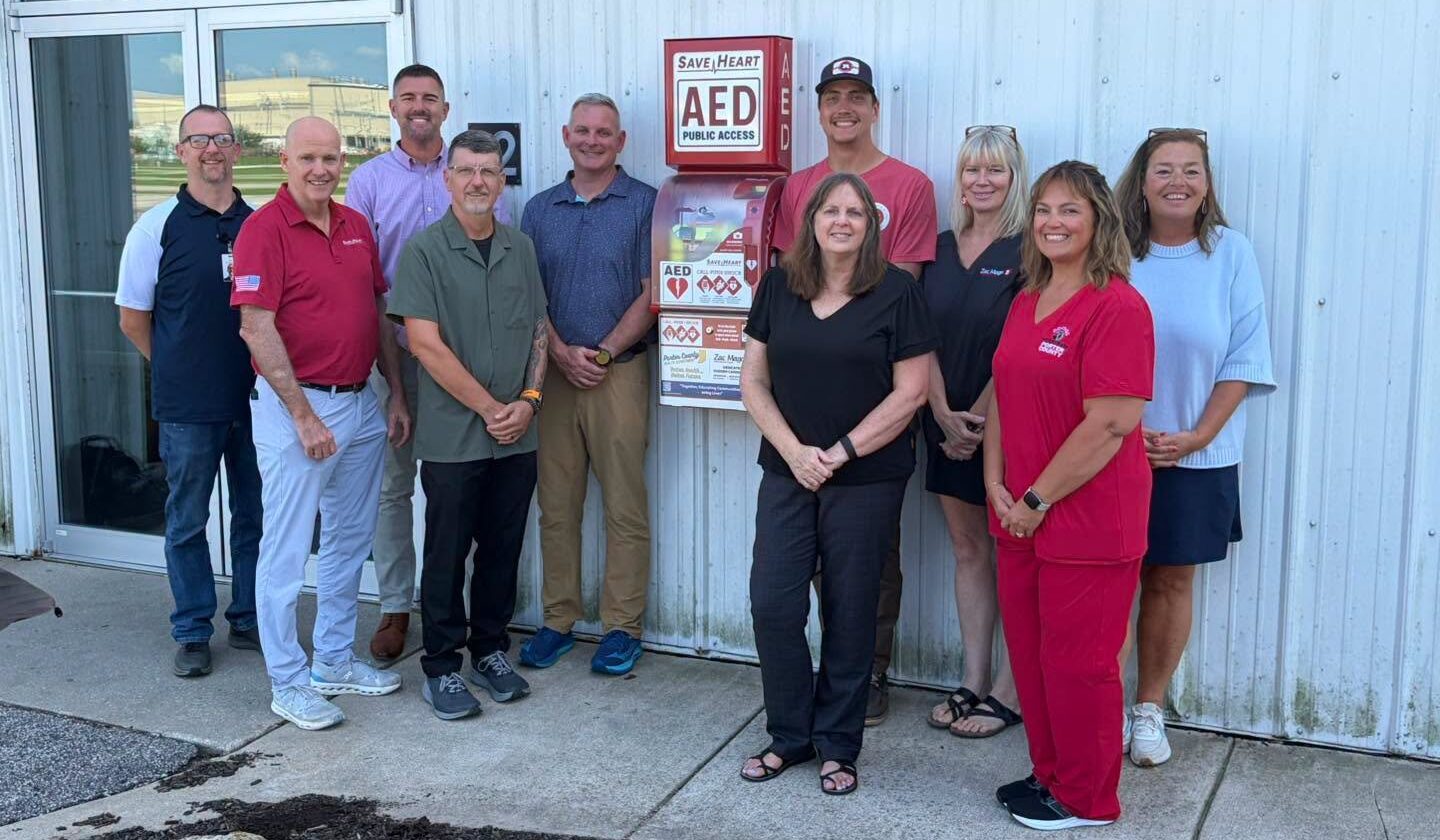 Partners from HEARTSafe Porter County, the Porter County Health Department, the Zac Mago Foundation and SaveHeart by HeartNation with a new SaveHeart by HeartNation Wall-Mount at the Porter County Expo Center